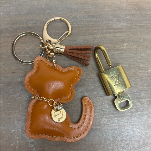 Authentic Louis Vuitton Lock Key Burnt Orange Cat Tassel, Bag Charm,Key Chain - Picture 3 of 9